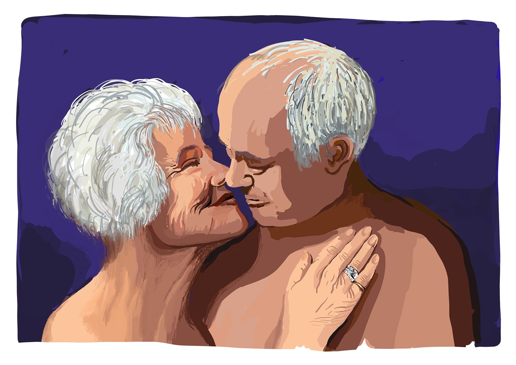 Ein älteres Paar hält sich in den Armen.